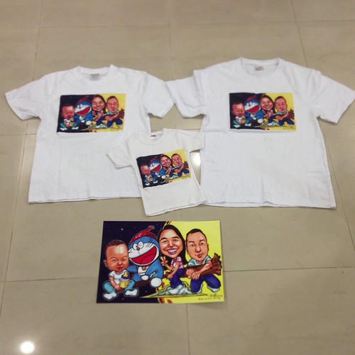 family caricatures with Doraemon printed on T-shirts