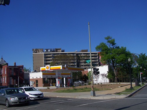 Shell Oil Station at 14th and Maryland Avenue, with Delta Towers senior housing in the background