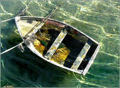 Small boat, Dundrum harbour, Co. Down. Trompe-l'oeil. View on black.