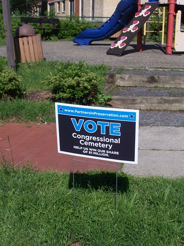 A yard sign promoting the Congressional Cemetery, in the Preservation Partners grant campaign