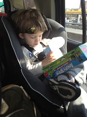 Just chillaxin', eating fishy-fishy and contemplating his new Angry Bird game. by Guzilla
