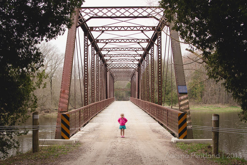 Small girl, Big bridge, Less snow.