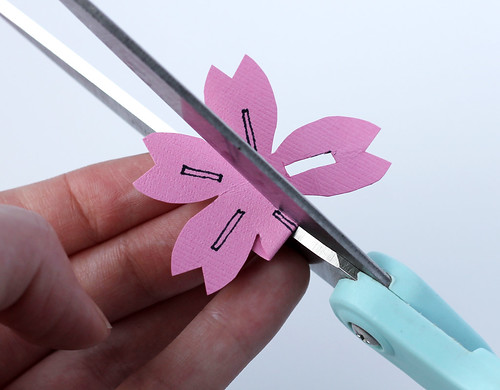 Cutting flowers out of paper or felt
