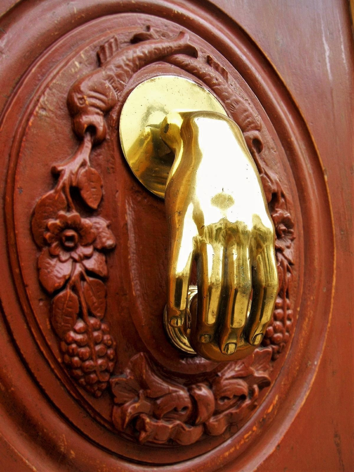 Hand door knocker from Jaén, Spain. Credit Zarateman
