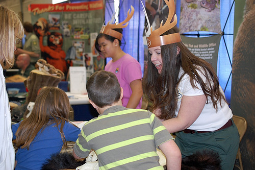 Youth learn about the characteristics of various wildlife species from acting Public Affairs Officer Jennifer Velez. (US Forest Service photo/Sam Cuenca)  