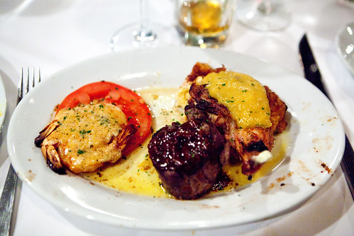 Filet mignon with bacon barbecue butter, New Orleans barbecue shrimp, Peach glazed and cheese stuffed chicken breast