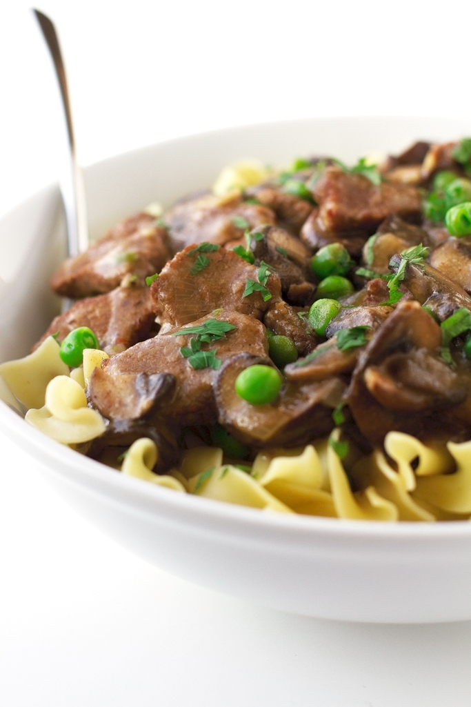 Beef Stew with Mushrooms over Egg Noodles - An easy to make stew with just a 20 minute prepwork! #stew #pasta #beefstew #dutchoven | Littlespicejar.com