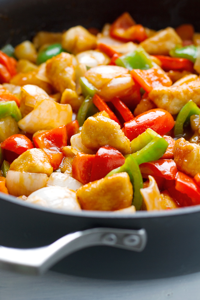 Lighter Sweet and Sour Chicken - it takes just 30 minutes from start to finish and it's healthier than your local takeout! #chinesefood #sweetandsour #asian #friedrice #chickenandvegetables | littlespicejar.com