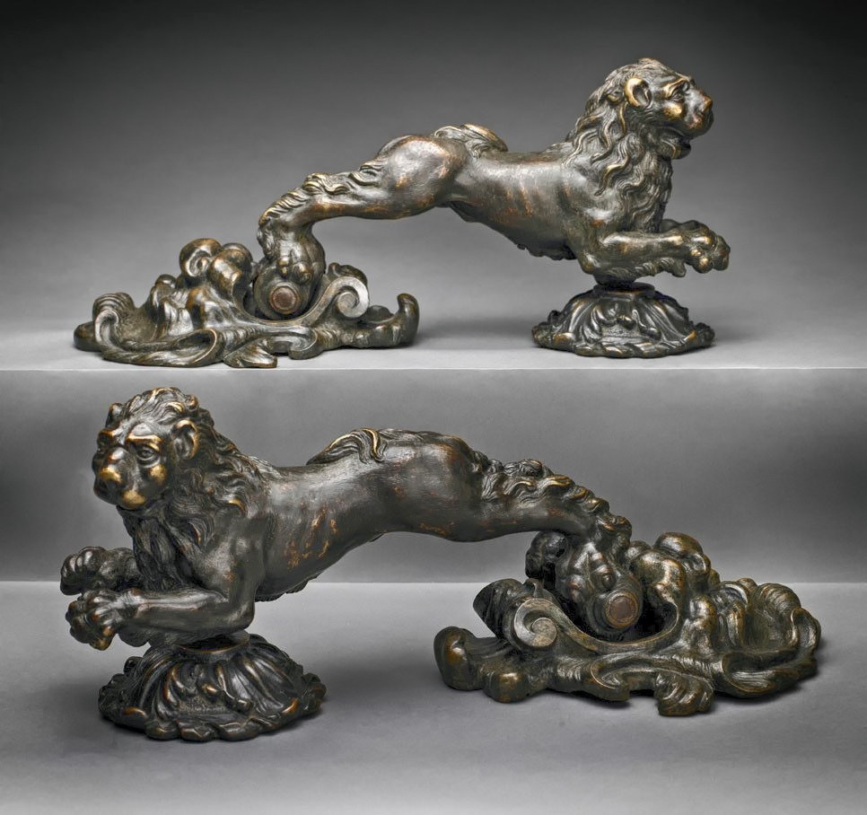 Early 1600s Bronze door knockers from Northern Italy featuring leaping lions and leonine mask backplates. metmuseum