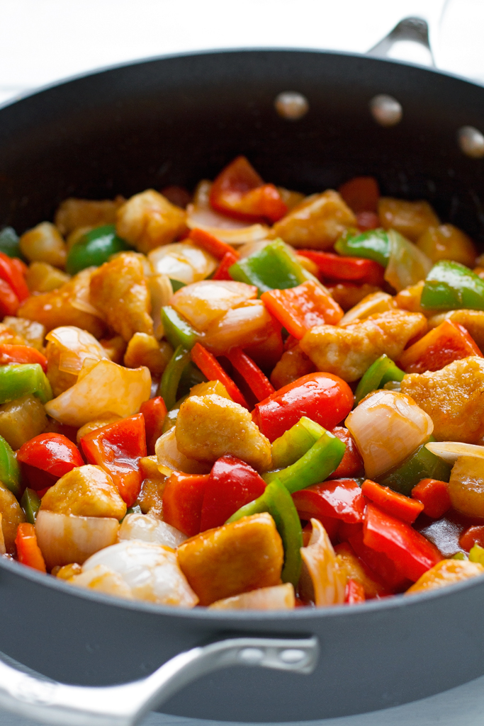 Lighter Sweet and Sour Chicken - it takes just 30 minutes from start to finish and it's healthier than your local takeout! #chinesefood #sweetandsour #asian #friedrice #chickenandvegetables | littlespicejar.com