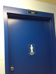 Boys to men, restroom door, Palisades Branch Library, Washington, D.C.