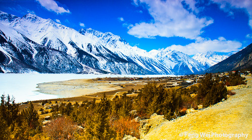 china travel vacation sky panorama cloud mountain lake snow color reflection tourism nature water beautiful beauty horizontal landscape scenery colorful asia tour view outdoor vibrant scenic vivid peaceful tranquility sunny nopeople panoramic tibet glacier serenity sacred stunning vista tibetan serene tranquil breathtaking magnificent ranwu ranwulake