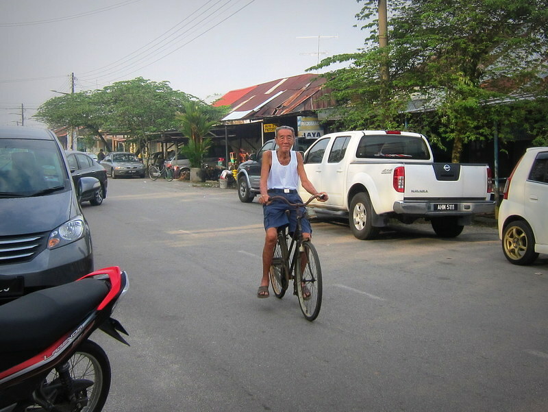 Suanie's 85 years old grandfather on bicycle