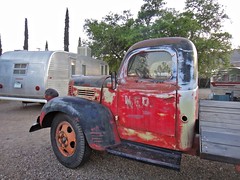 Vintage Red Pickup and Airstream Trailer
