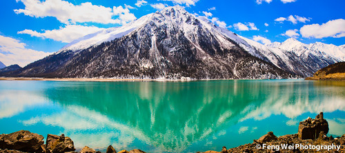 china travel vacation sky panorama cloud mountain lake snow color reflection tourism nature water beautiful beauty horizontal landscape scenery colorful asia tour view outdoor vibrant scenic vivid peaceful tranquility sunny nopeople panoramic tibet glacier serenity sacred stunning vista tibetan serene tranquil breathtaking magnificent ranwu ranwulake gettychinaq2