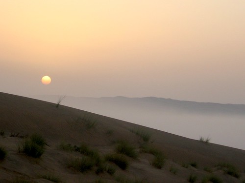 Sunrise and mist over the Wahiba