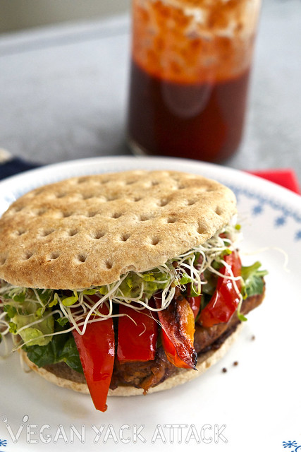 close up photo of bbq tempeh burger