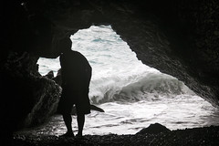silhouette of the guy inside the cave