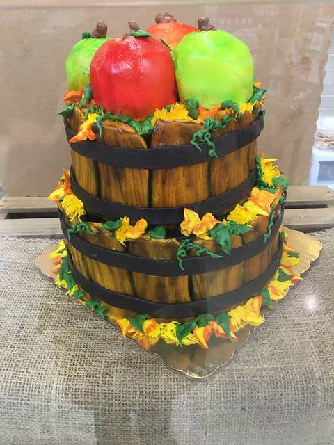 All buttercream basket of apples cake. 8 and 6 cakes with 4 cupcake apples on top by Anna Ubel‎