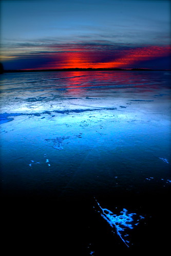 blue winter sunset red sun ice minnesota frozen purple smooth