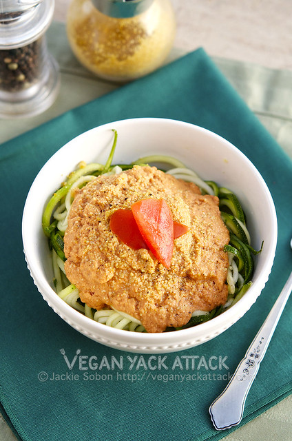 Raw Creamy Tomato Basil Pasta: A delectably light summer meal of zucchini noodles entangled with a raw, creamy tomato basil sauce.