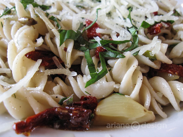 Roma pasta with pine nuts, pumpkin seeds, sun dried tomatoes, herbs and roasted garlic