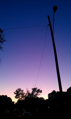 trees sunset sky sun cars lamp streetlight purple huntington wv