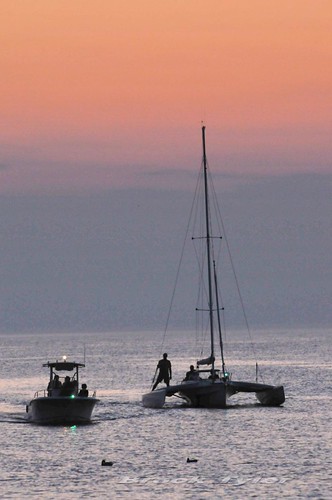 sunset summer silhouette evening harbor boat harbour dusk lakemichigan trimaran southhaven beautyofwater puremichigan