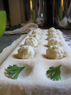 2. Fill the dips with your cheese mixture, about a teaspoon full. I placed a parsley leaf in first: