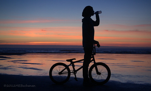 ocean boy sunset beach bike silhouette washington bmx pacific longbeach