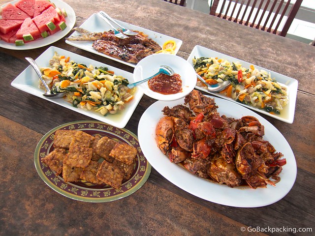 Our first lunch on the klotok included fresh crab, fish, salads, rice, and watermelon