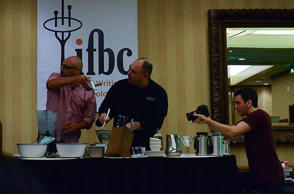 A live cooking demo being photographed by Andrew Scrivani.