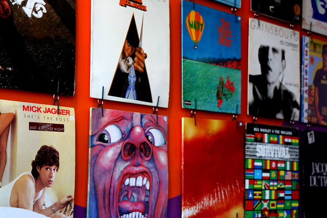 A wall of albums at a Paris flea market