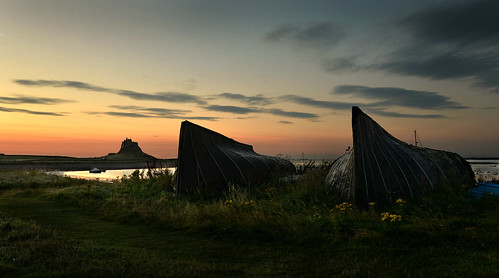lindisfarne boat huts holyisland northumberland sunrise dawn castle
