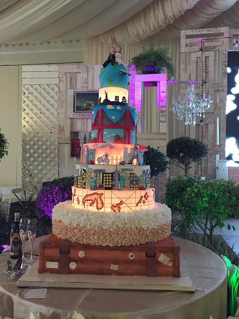 Travel Themed Wedding Cake by Clarice Hau