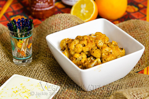 This in an intensely flavorful appetizer of baked Thai Curry Cauliflower Bites with a creamy coconut lime aioli. Allergy-friendly, pretty healthy, and VERY tasty! #vegan #vegetarian #appetizer #thai #cauliflower