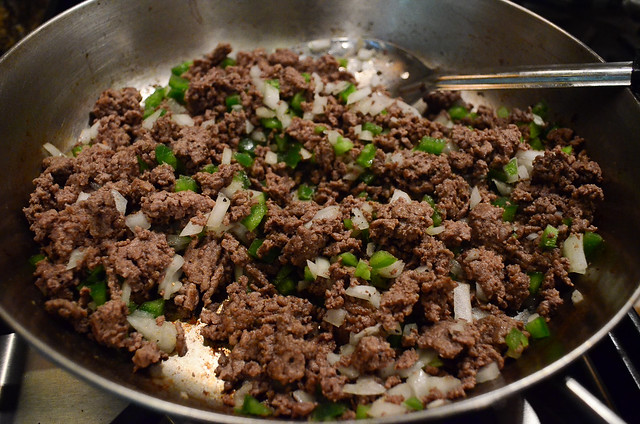 The ground beef being prepared.