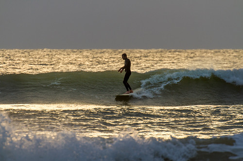 Sundown Surfer - One more wave