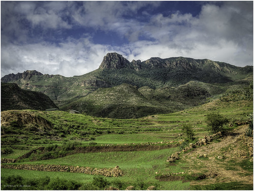 clouds cloudy ethiopia house landscape meadow mountain mountains tree valley southtigray tigray