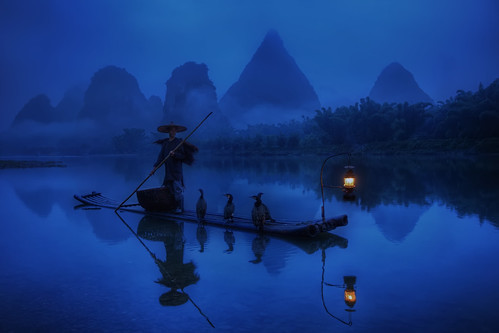 china morning travel blue trees light mist mountain man mountains slr water lamp hat fog digital photoshop sunrise canon river cormorants person eos dawn liriver li photo fisherman asia cloudy guilin yangshuo fineart hill chinese pole hills explore photograph figure processing limestone lone 5d cormorant bluehour dslr 漓江 karst fareast hdr highdynamicrange lijiang southchina mkii guangxi markii eastasia 桂林 postprocessing travelphotography ricehat lijiangriver 广西 photomatix cormorantfisherman explored cooliehat 阳朔县 thefella paddyhat 5dmarkii 陽朔縣 conormacneill thefellaphotography