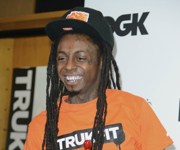 Rapper Lil Wayne and skateboarder Stevie Williams attend the launch of TRUKFIT at Macy's Beverly Center in Los Angeles, California