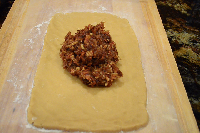 The date mixture is added on top of the cookie dough.