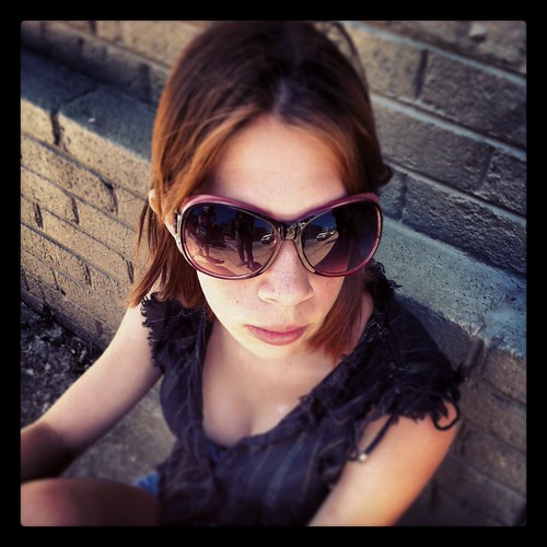 girl sunglasses bricks