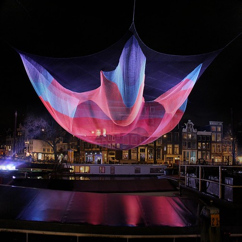 city pink blue winter light sunset red urban sculpture holland colour reflection art net water colors amsterdam festival architecture night river lights hall topf50 colorful wind walk ghost bridges waterloo hour sail janet shape topf100 mokum waterlooplein artworks amstel 126 muziektheater stopera projections sqaure blauwbrug echelman artisticexpression 100faves 50faves illiminated lichtfestival reshapes
