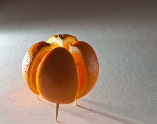 The final position ready to photograph the orange obscures as many of the toothpicks as possible.