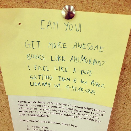 A sticky note on a bulletin board reads, Can you get more awesome books like Animorphs? I feel like a dope getting them at the public library with nine-year-olds.