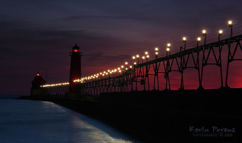 blue light sunset red sky sun lighthouse reflection water clouds dark lights evening pier kevin michigan lakemichigan april grandhaven westmichigan 2013 povenz