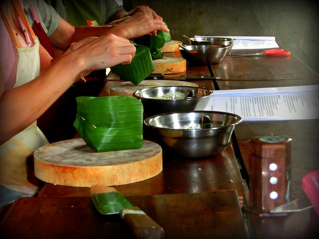 Making banana leaf bowls at our cooking class