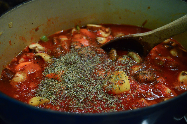 Italian seasoning is added to the pot.