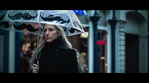 street woman netherlands umbrella canon eos 50mm f14 candid arnhem streetphotography blond mustache cinematic ef50mmf14usm img1192 2013 60d canon60d jeffkrol